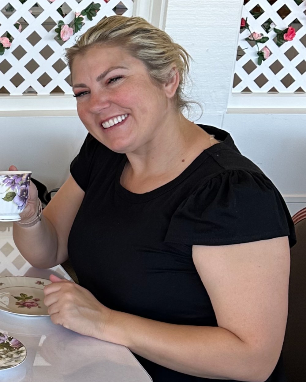 Rose Martin smiling at afternoon tea before beginning her wellness transformation