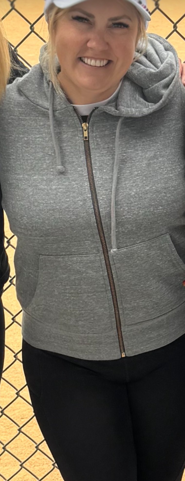Rose Martin smiling in casual clothing during an earlier stage of her wellness journey